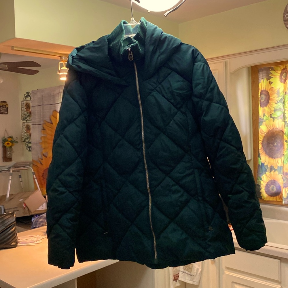 A green Zeroxposur winter jacket